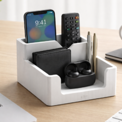 White minimalist desk organizer holding a smartphone and wallet on a clean office table