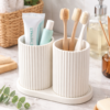 Easy-to-clean white toothbrush holder with detachable base tray to prevent water buildup