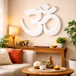 Spiritual ॐ symbol wall art hanging in a modern Indian living room above a sofa