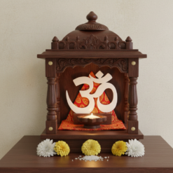 Om 3D printed wall decor placed inside a home temple with marigold flowers