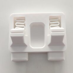 Soldering iron next to Anant PCB holder on a clean electronics workbench