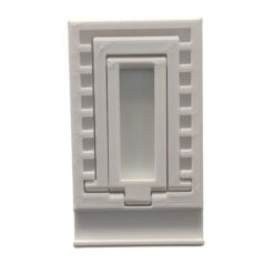 Smartphone on a white stand for hands-free video calls and office meetings