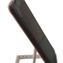 Mobile phone stand being used to follow a recipe on a kitchen counter