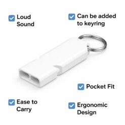 Referee using white whistle outdoors during football match for clear loud signal